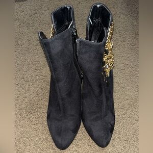 Elegant Black Women's Boots with Gold Accent